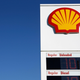 The Shell logo pictured on a Royal Dutch Shell gas station sign.